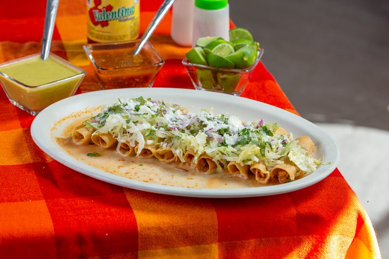 Chuys cheese enchiladas with green sauce